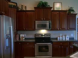 Dark cherry cabinets and laminate wood flooring paint colors. Kitchen With 42 In Upgraded Cherry Cabinets And High End Stainless Steel Appliances Kitchen Technology Cherry Cabinets Kitchen Kitchen Cabinets