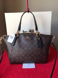 Black And Brown Coach Purse Coach F28989 Signature Light Weight Small Kelsey Brown Black New With Tags Approximate Measurements 10 1 4 L X 7 H X 3 1 2 Coach Purses Purses Bags