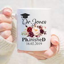 Celebrate with unique graduation gifts from my science boutique's graduation gifts collection. Custom Phd Graduation Gift Phd Mug Phinished Mug Doctor Gift Gift For Phd Graduation Gift New Doctor Mug Phd Student Gift Doctorate Mug In 2021 Phd Graduation Gifts Phd Gifts Phd Graduation