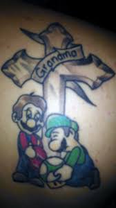 The full color tattoo boasts an asian theme with a large central figure surrounded. Video Game Tattoo Later Levels
