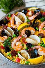 This Seafood Paella Is A Blend Of Saffron Rice Spanish Chorizo Shrimp Clams And Mussels All Simmered Together Seafood Paella Frozen Seafood Seafood Recipes
