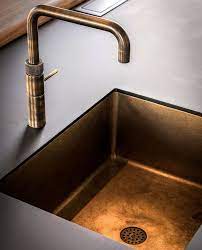 Geef hem de tijd om te rijpen en hij wordt mooier, steeds mooier. Quooker Patina Fusion Square Kraan Onyx Amsterdam