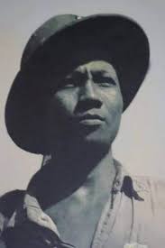 Who are the men in the old Guam police photos?