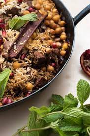 Spiced Lamb And Rice With Walnuts Mint And Pomegranate Recipe Recipe One Pot Meals Recipes Lamb Recipes