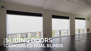 Sliding glass doors are lovely because they bring in natural light, give us access to the outdoors, and show us our view. Double Roller Blinds Hidden In Sliding Doors Youtube
