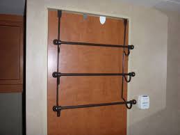 Bungee cords secured on top and below the door keep it in place. Over The Door Towel Rack Parts Home Design Ideas By Matthew Over The Door Towel Rack For Bathroom