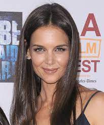 Loose curls with straight fringe. Center Part Hairstyles