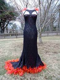 Known as a skilled archer and hunter, katniss is a strong, independent female presence. 13 Things Every Hunger Games Fan Needs To Own Hunger Games Costume Fire Costume Costume Dress