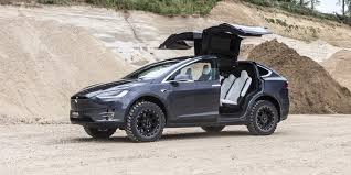 From a video on the model y page, we can see that it definitely has more space. Watch Tesla Model X Go Off Roading In Deep Mud Electrek