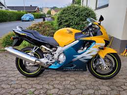Image result for Nuget Yellow 1999 Motorcycle