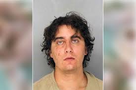 Grandson pictured 'covered in blood' after allegedly shooting grandmother  and killing her husband