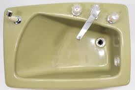 sold price: vintage avocado green sink