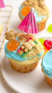 🏖️☀️Beach Cupcakes @kathryns.kitchen.blog , Made with your favorite  cupcake flavor, ocean blue frosting, candy beach towels, crushed graham  cracker sand, cute little Teddy Grahams and colorful paper ...
