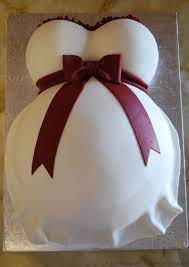 This Pregnant Belly Cake Is Gorgeously Done Pregnant Belly Cakes Baby Bump Cakes Baby Shower Cakes