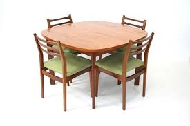 Our collection of dining room furniture include perfectly coordinated tables, chairs, sideboards and cabinets for effortless furnishing. Vintage 1970s Teak Danish Influence Dining Table And Chairs Vinterior Midcentury Modern 20thcentury Dining Table Chairs Dining Table Retro Dining Table