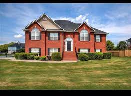 Image result for dark red brick house with black shutters black garage door. What Color Shutters Would Look Nice On Red Brick