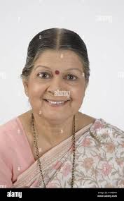 Senior indian lady in sari hi-res stock photography and images