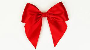 To make a double bow, leave the tails long, make another loop with one tail, and repeat the previous step. How To Make A Bow I Easy Ribbon Bow Tutorial I Diy Youtube