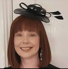 Driving licence query. I have done the exchange but my photos keep getting  rejected because my hair is too light against the background. They have  asked for another photo, "with the background