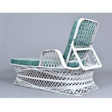 It's both an elegant and stylish way to relax. Russell Woodard Spun Fiberglass Vintage Outdoor Chaise Lounger