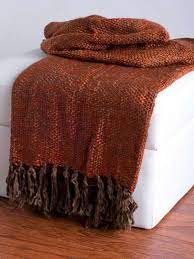 The colors, patterns, and fabrics provide infinite possibilities and combination for every occasion and style. Designer Rust And Brown Fringed Throw Blanket Luxury Throw Blankets Fringe Throw Blanket Throw Blanket