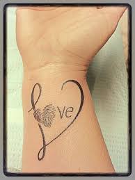 My Tattoo Finally Did It And Love Love Love It Hubby S Writing For The Word Itself And My Boys Tattoos For Daughters Fingerprint Tattoos Tattoos For Kids