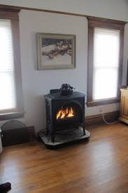 It is ventless, fueled with gas, equipped a.o. Valor Madrona Mf28jln Direct Vent Gas Cast Iron Freestanding Stove Installed On Raised Hearth On Outs Vent Free Gas Fireplace Gas Fireplace Freestanding Stove