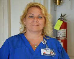 A phlebotomist usually carries equipment to draw blood, but when Westerly  Hospital's Ann Keszyinki heard a “Code Red” called recently for Operating  Room 3 during a thunderstorm, she arrived carrying a fire