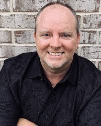 Please join us in welcoming Ken Passmore as our school's Music and Band  Teacher. Mr. Passmore is taking the place of Mr. Crofoot, who is moving out  of state. As an undergraduate,