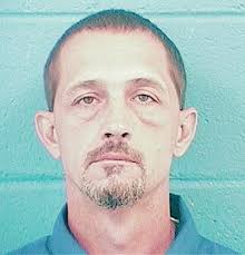 Man pleads guilty to burglary of home; stolen firearm case continues