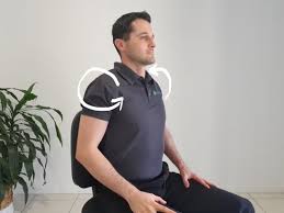 Person doing shoulder rolls