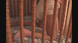 Girl soils her diaper in crib for fun at ThisVid.com