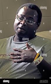 ADVANCE FOR USE SUNDAY, JULY 28, 2013 AND THEREAFTER- This July 11, 2013,  photo shows Dexter McClure, who is living at the Salvation Army in  Florence, Ala., as he gets his life