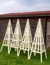 4 Sweet Pea Design Wooden Garden Obelisks Painted New White From Farrow Ball These Are For A Garden Designer Garden Obelisk Wooden Garden Obelisk Trellis