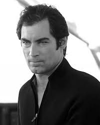 According to the James Bond film tailors in London, at 6' 2" Timothy Dalton  is the tallest of all the Bond actors. The tailors who have fitted and  measured each of the