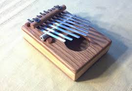 Make A Thumb Piano Mbira Homemade Instruments Thumb Piano Homemade Musical Instruments