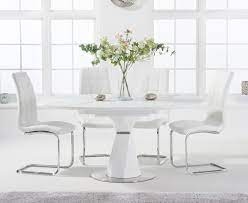 Expect a big dose of farmhouse charm with the etolin extendable dining table that features clean lines and a captivating rustic look. Jackson 120cm Round White Extending Dining Table With Lorin Chairs