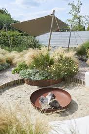 inspiratietuin duintuin downtown de tuinen van appeltern in 2020 tuin vintage tuin decor tuin palen