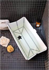 You can also shower with your baby. Bathing A Baby In A Small Home Space Saving Tubs Sink Tubs Baby Bath Tub Baby Tub Tub Ideas