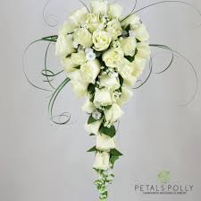 Your wedding bouquet is one of the most important staple pieces as you walk down the aisle on your big day. Ivory Cream Rose Brides Teardrop Bouquet