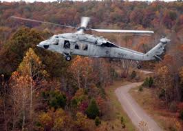 A helicopter can legally fly at a lower altitude if the operation is conducted without hazard to persons or property on the surface. An Mh 60s Knighthawk Helicopter Flies Over Fort Knox Ky