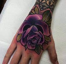 Rose tattoos are full of beauty and symbolism, it shows elegance, passion and love. Purple Rose Tattoo Tatouage Rose Poignet Tatouage Tatouage Rose