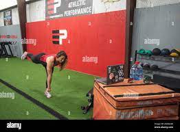 Faith Cooke, Director of Adult Performance at Edge Performance in Tyler,  Texas, leads an online Zoom full-body fitness class on Friday, April 3,  2020 in Tyler, Texas. Edge Performance switched to virtual