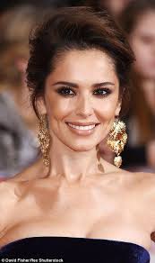 Cheryl, 32, looked sensational as she showed off her superslim figure in a  gorgeous halter-neck gown in glittering gold. The Fight For This Love  hitmaker let the dazzling number talk for itself,