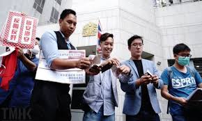 Hkers Tear Up Bno Passports In Front Of Consulate To Protest Against Uk Interference Over National Security Law Global Times