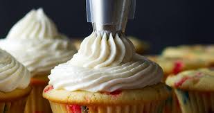 Take the vanilla bean pod and place it in a small pot with the sea salt and heavy cream. American Buttercream With Butter And Heavy Cream Of Batter And Dough