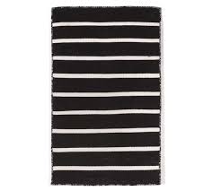 Angue Striped Indoor Outdoor Rug Black Pottery Barn Thin white lines stripe a graphic pattern in a soft wool/cotton blend.