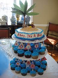 Ahoy Its A Boy Nautical Baby Shower Theme Sailboat Cupcakes And Island Cake Nautical Baby Shower Baby Shower Nautical Theme Baby Shower Cakes For Boys