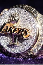 The current version of the lakers logo comprises of a basketball that exemplifies the nature and identity of the team, the stretched lines that appear from the team's name embody the the lakers logo features a slightly modified adaptation of the bodoni font family. World Champions Lakers Championships Lakers Wallpaper Lakers