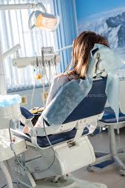 Patient Sitting On Dental Chair Waiting For Her Dentist Dentist Dental Dentist Office